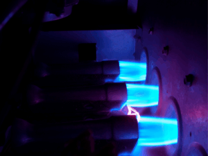 Close up of flame sensor on furnace