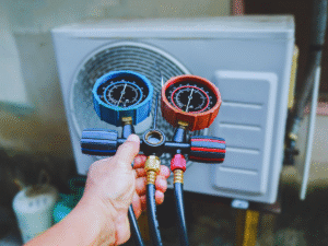 HVAC tech testing for refrigerant leak